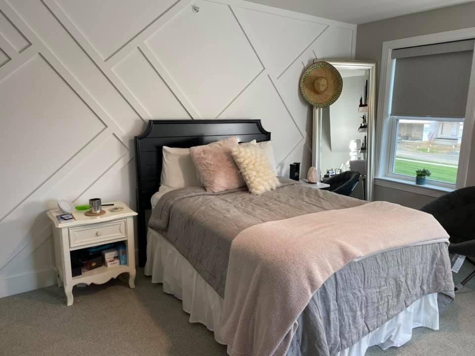 Installed and painted wood trim feature wall 