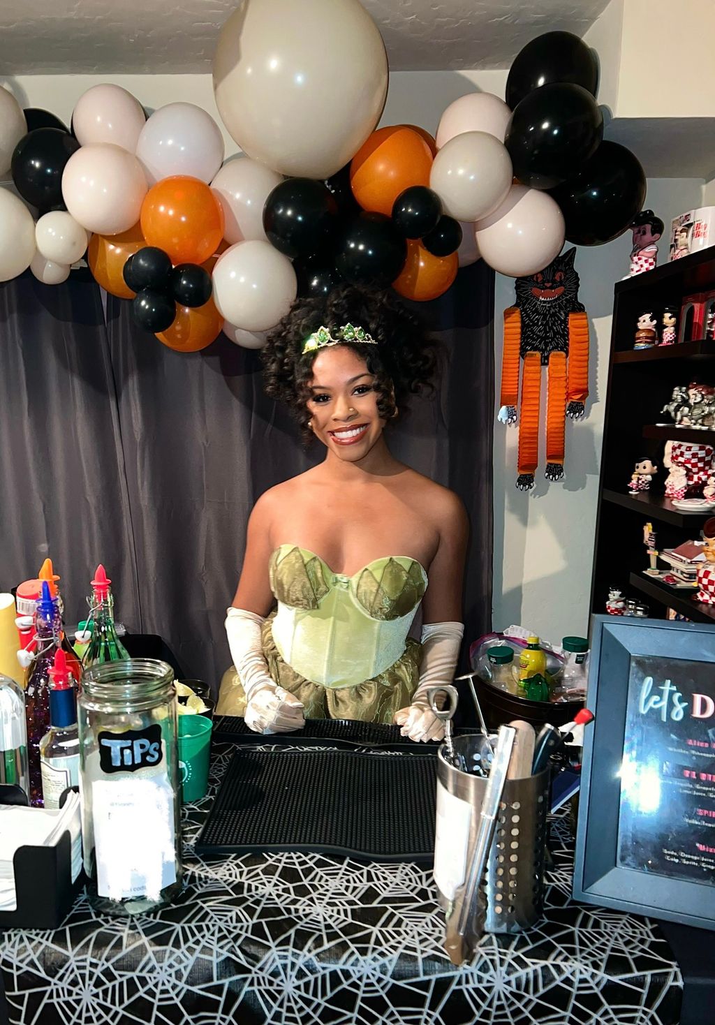 Toni, my co-owner, bartending a Halloween bash wit