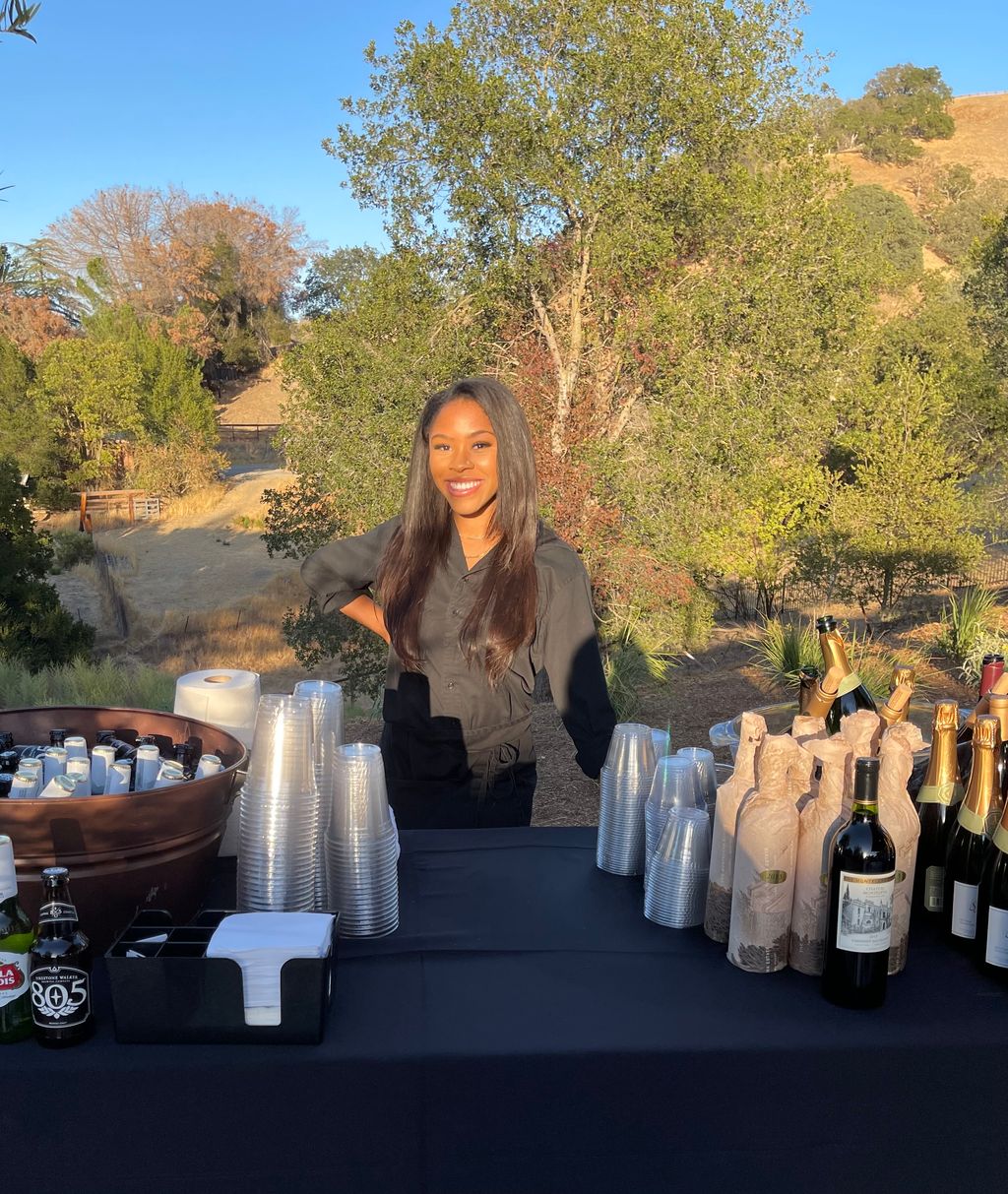 Toni, my co-owner, bartending an end of life celeb