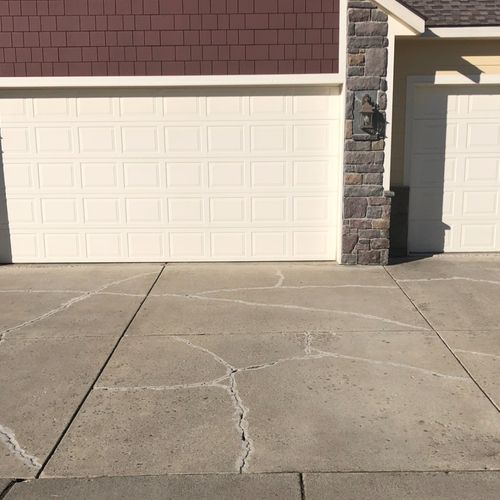 We had our cement driveway cracks repaired and epo