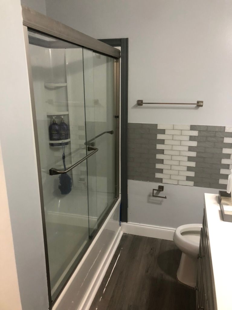 New glass shower door and trim 