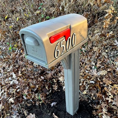 A vehicle hit our mailbox and broke the post. Mari