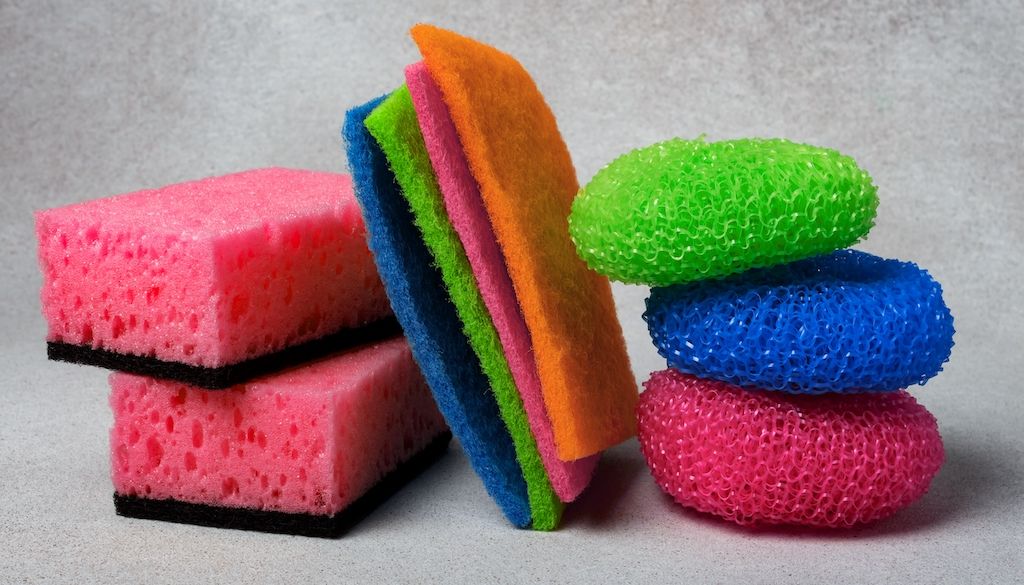 assortment of colorful sponges of different types