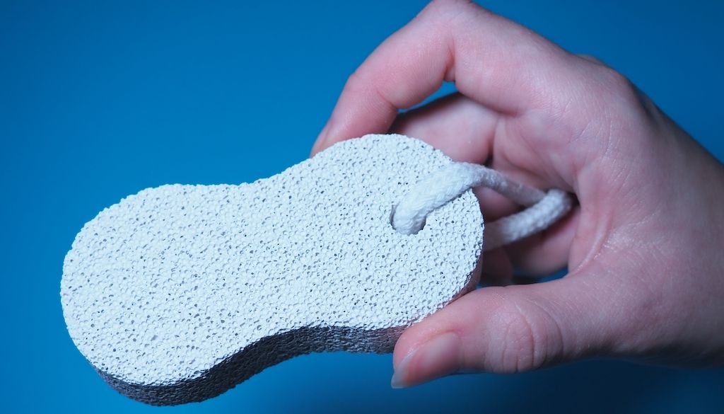 hand holding a pumice stone