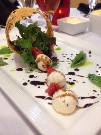 Mozzarella salad with  Parm cheese Tuile