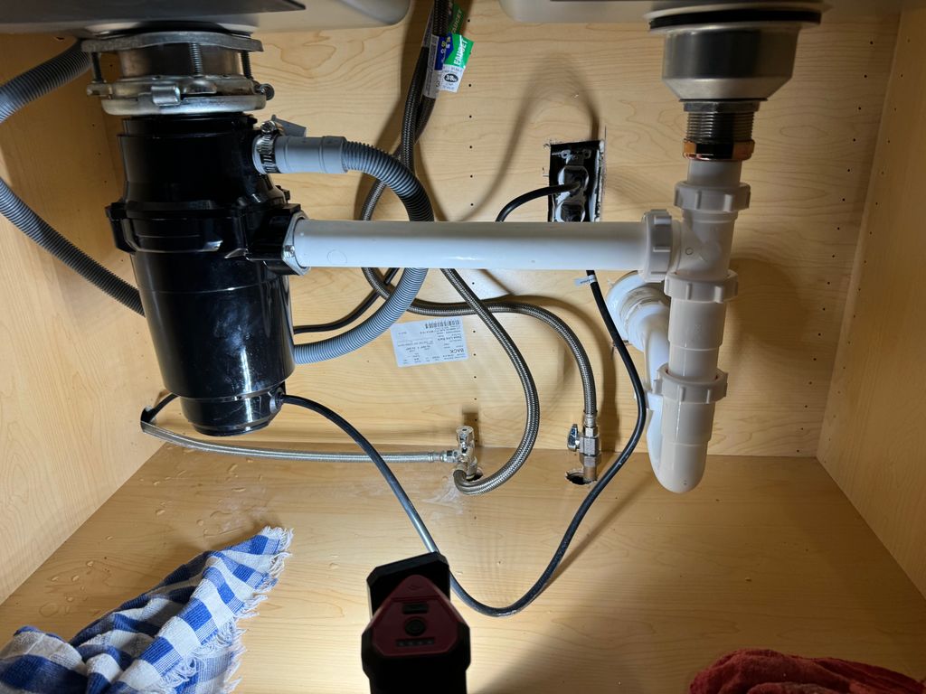 Installed garbage disposal, new shut off valves, a
