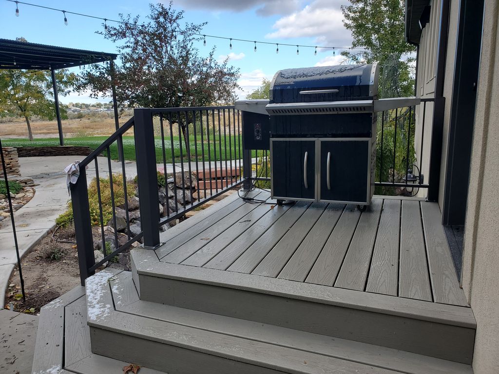 Trex deck designed and installed. Railing custom b