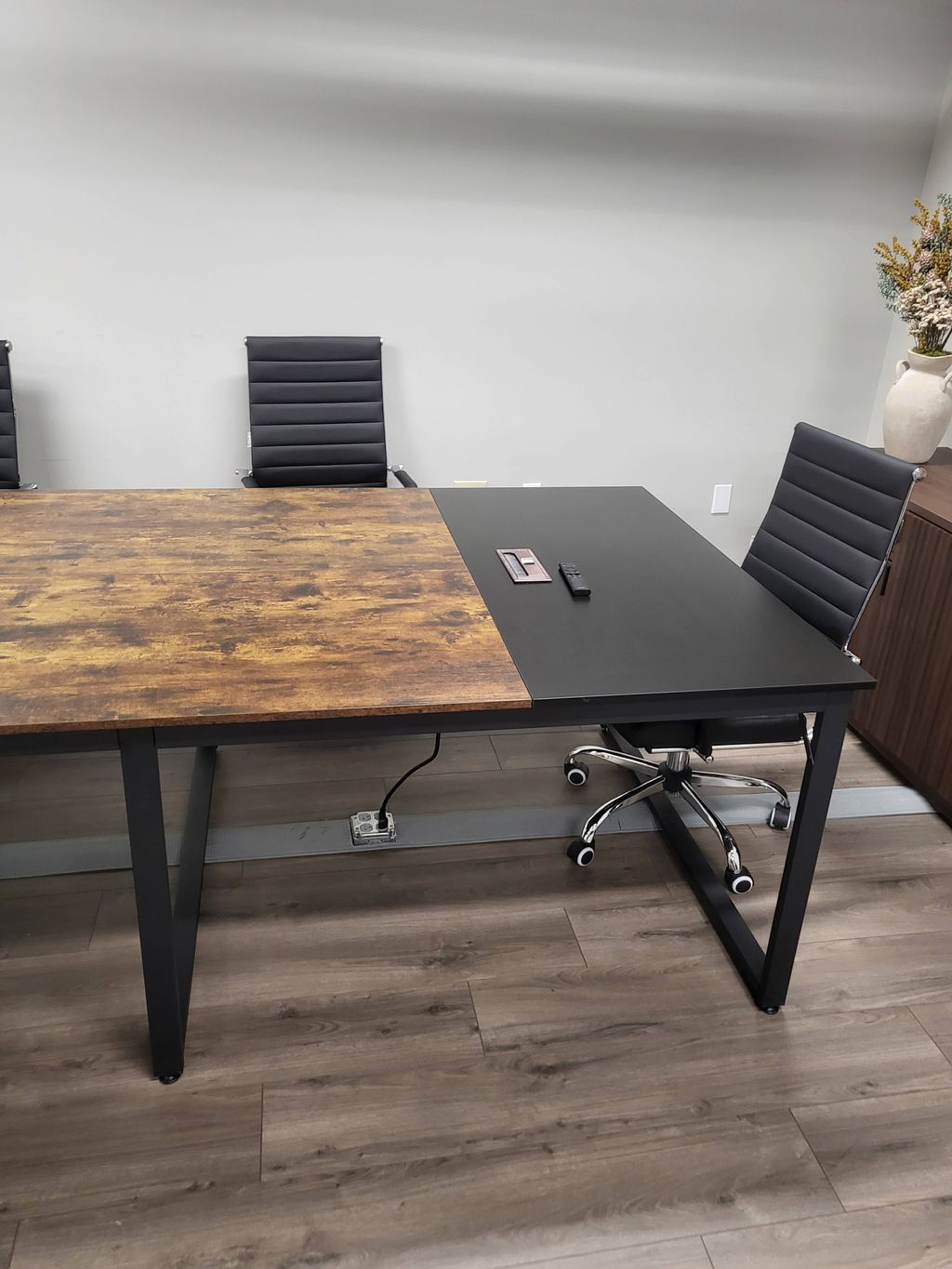 Floor outlet for protected office computer tables.