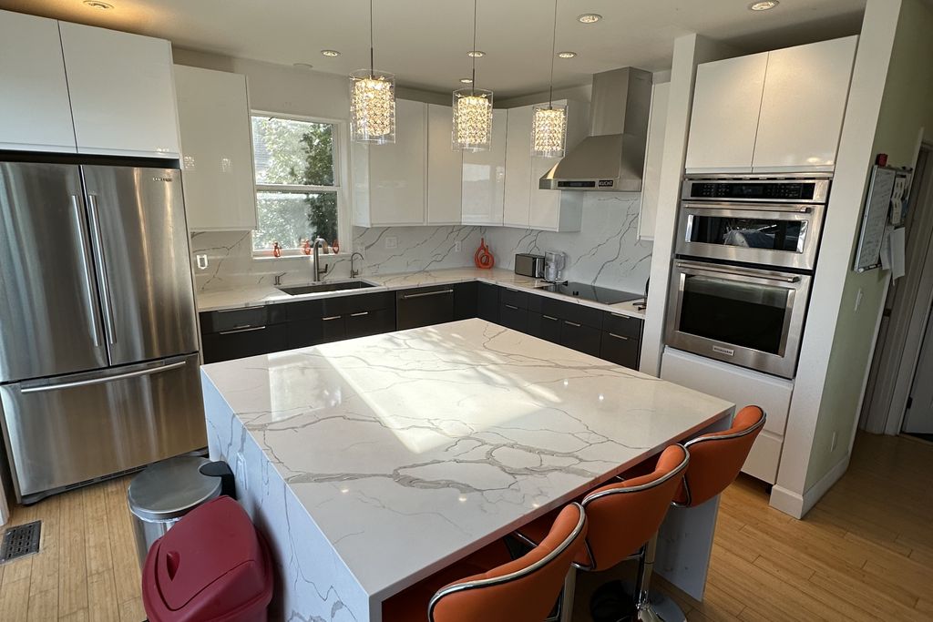 Kitchen With Chair, Floor, Kitchen Island, And Refrigerator Ideas