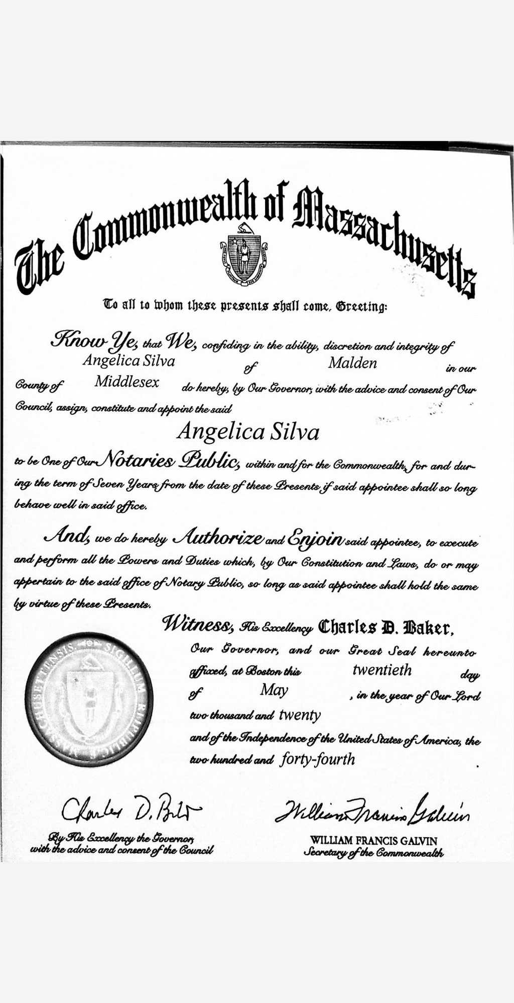 Proudly displaying my official notary commission—a