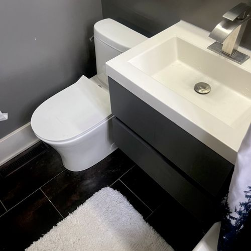 Very fancy modern vanity that sits off the ground 