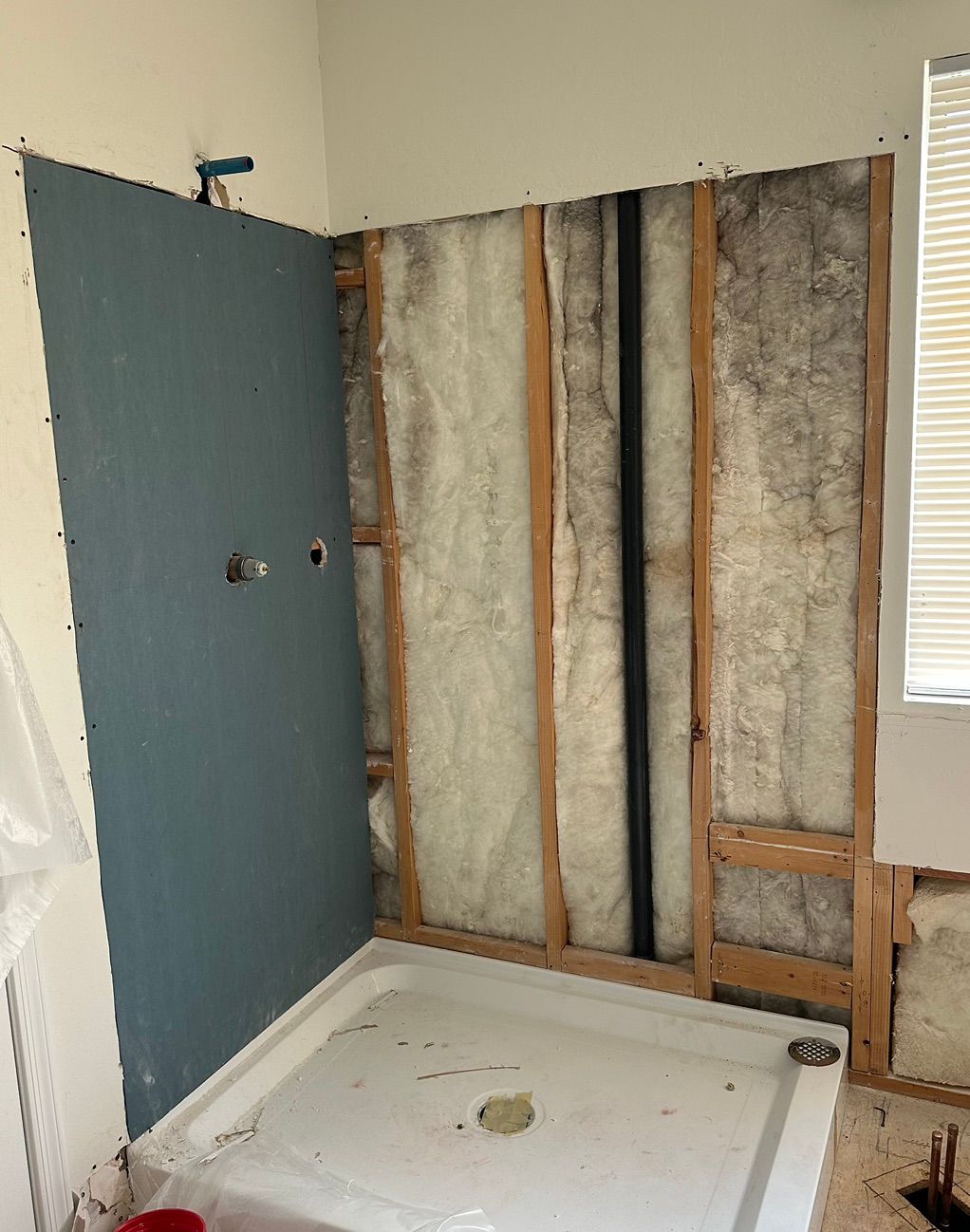 Drywall project on a shower and tub area.   Hangin
