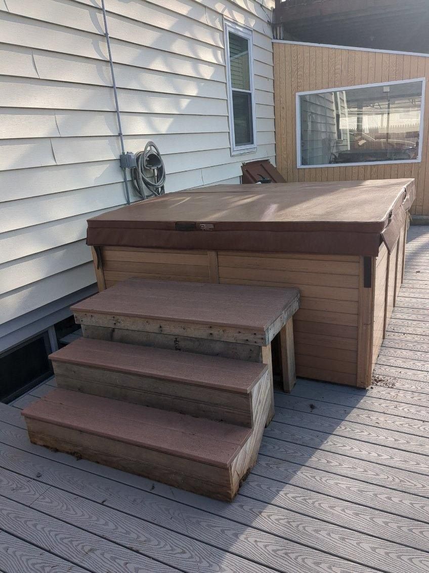 1000 pound eight person hot tub moved from one hou