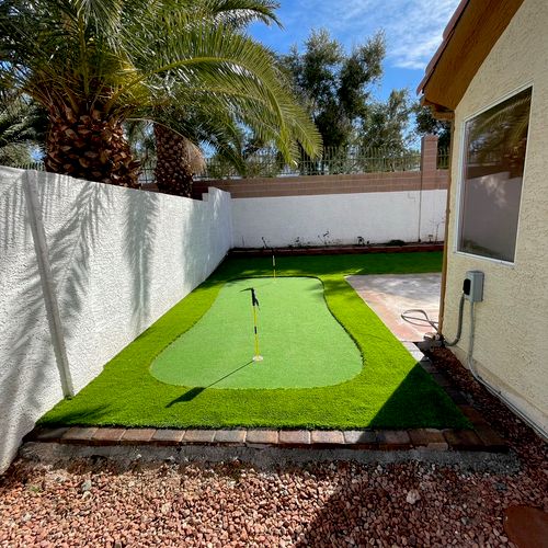 Pavers, turf, and putting green installation