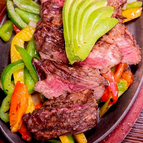 Mexican plated dinner;
Fajitas are served! 
Steak 