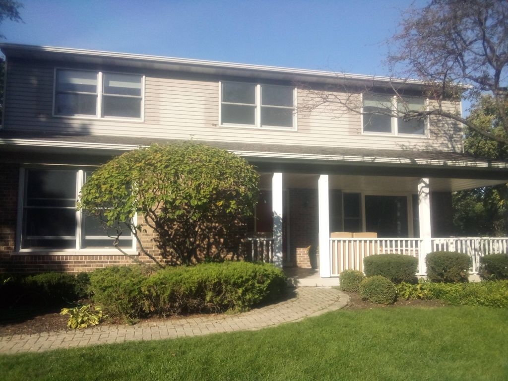 customer exterior before Mannat Paint Pros