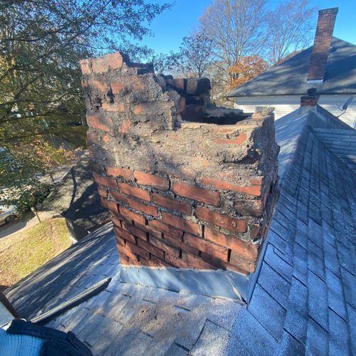 brick chimney needing repairs