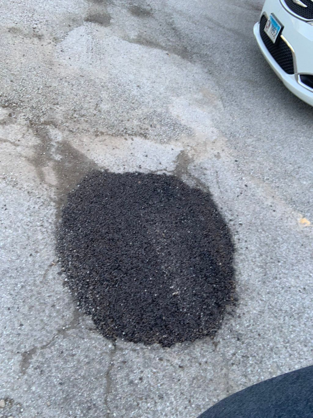 After I filled in the hole with hot asphalt