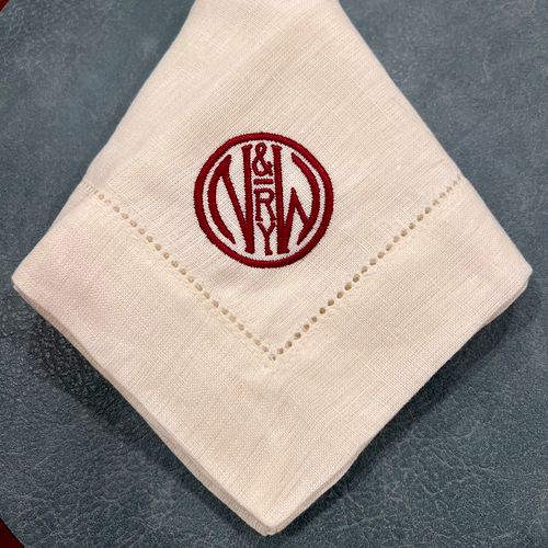 The napkins came, embroidered to perfection in a m