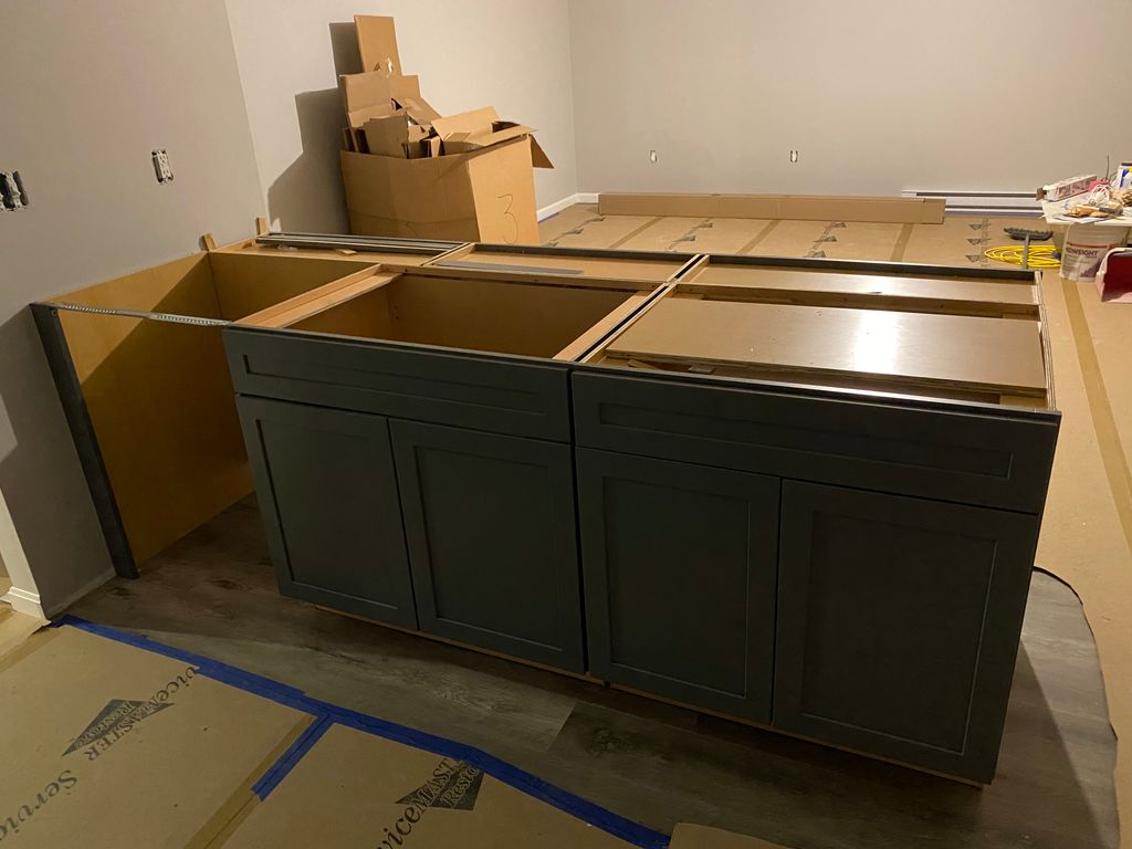 Install kitchen cabinets 