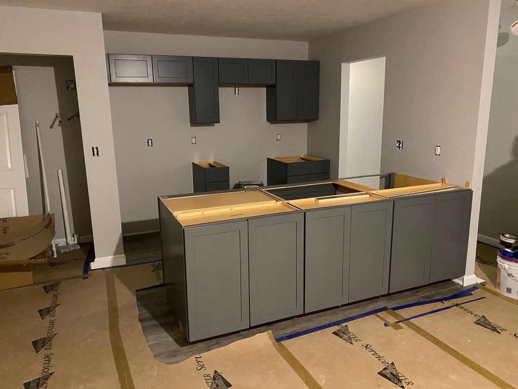 Install kitchen cabinets 