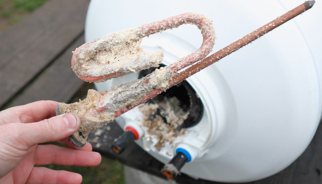 sediment build up on water heater anode and heating element