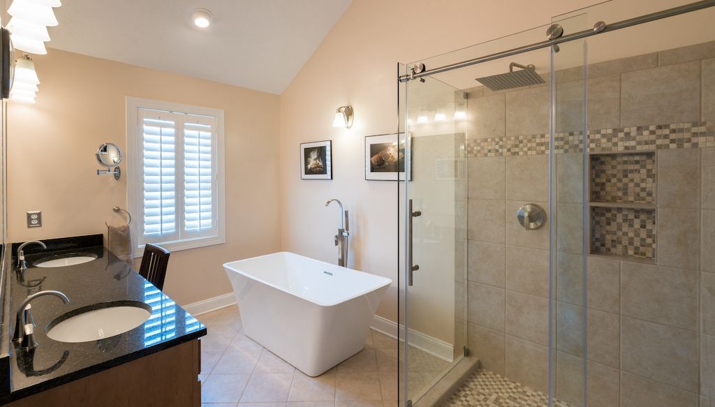 bathroom with spa shower head, free standing modern tub