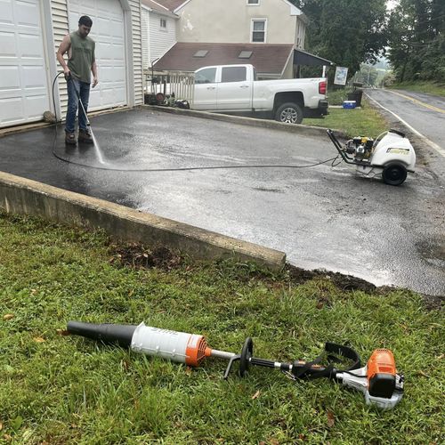 cleaning the driveway before sealcoating