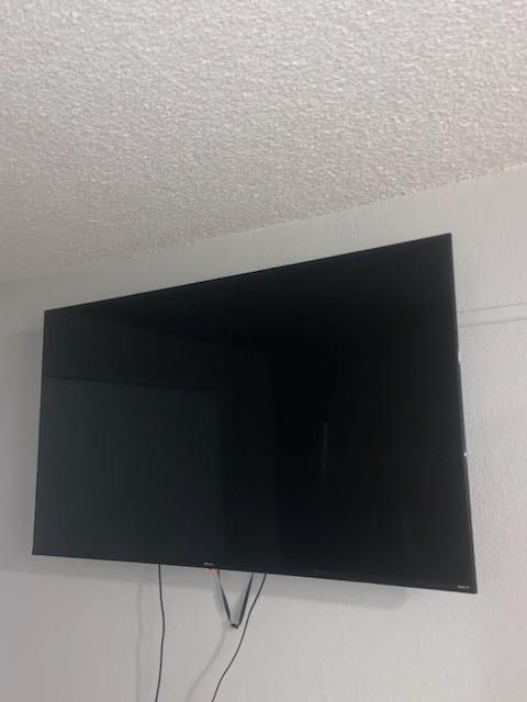 55 inch TV hung. Yes we use studs. 