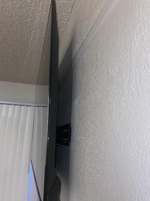 55 Inch TV hung. Yes mounted to studs. 