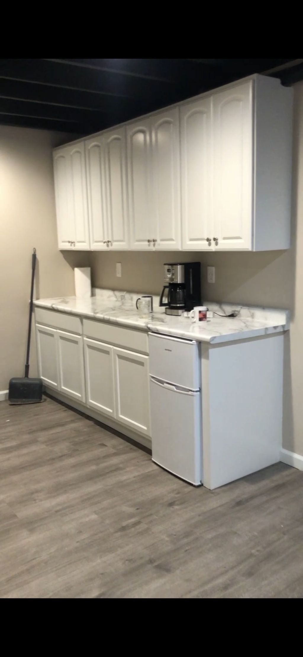 New cabinetry, flooring, and countertop.