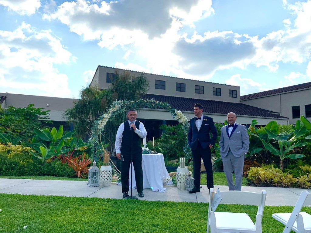 The groom and our officiant waiting for the bride 