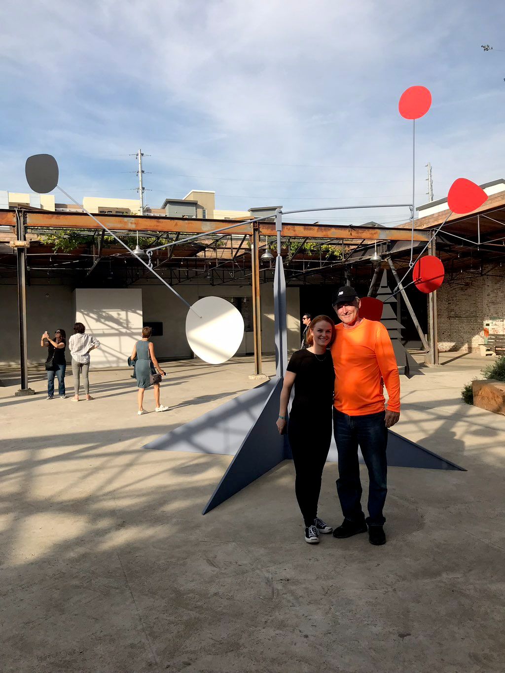 JJ and Clare in front of a Calder Mobile at Hauser