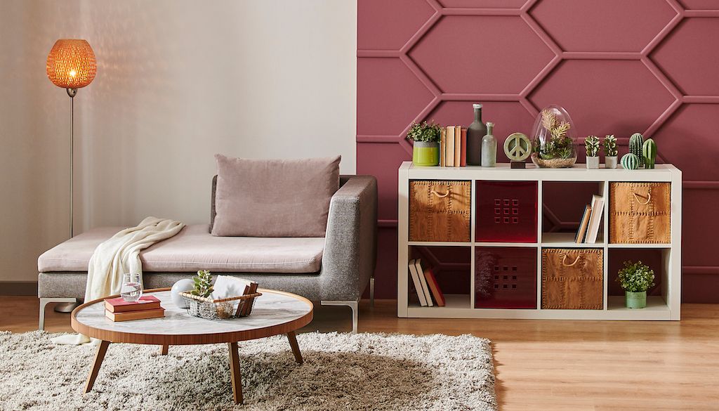 living room with earthy color palette and dusty rose, floral pink wall