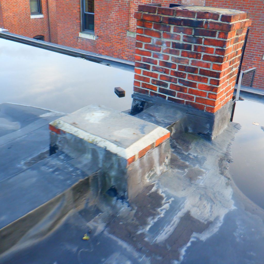 Capped incinerator chimney