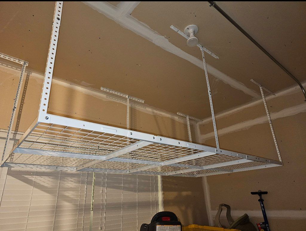 Garage ceiling storage system 
