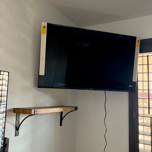 John installed several tv's and a closter organise