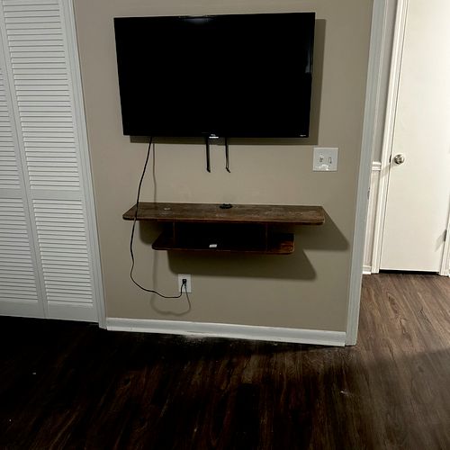 Did a great job with tv and shelf