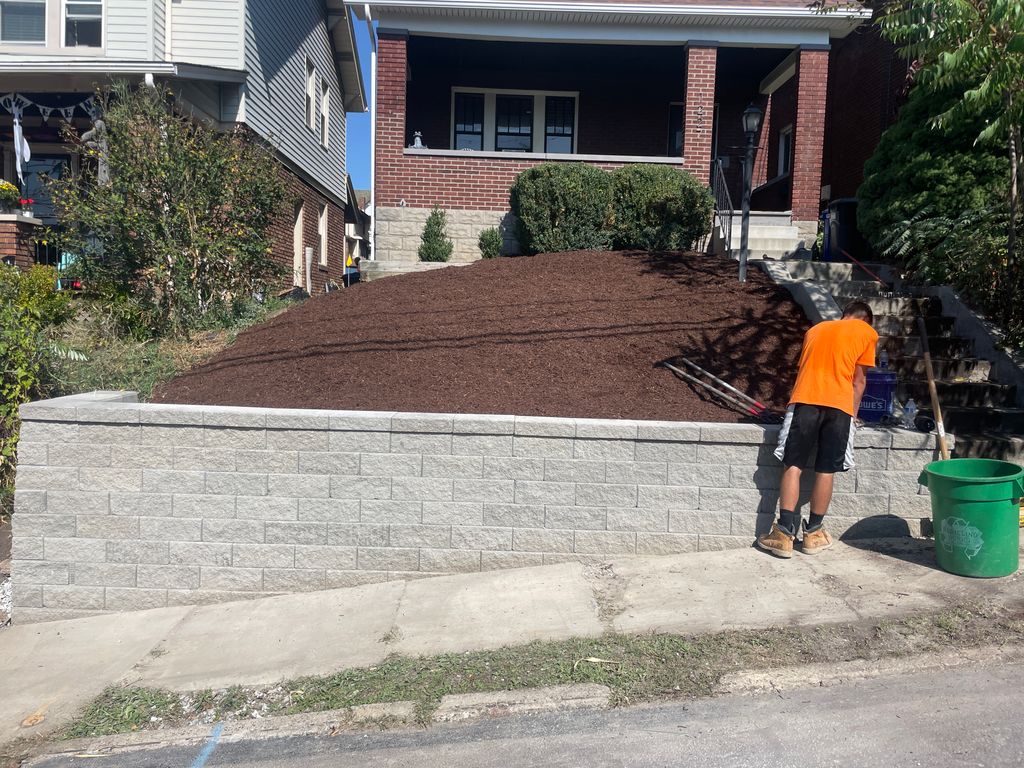 Our Team built the wall and laid the mulch once it