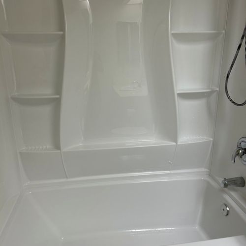 Had fiberglass tub and shower panels installed. Na