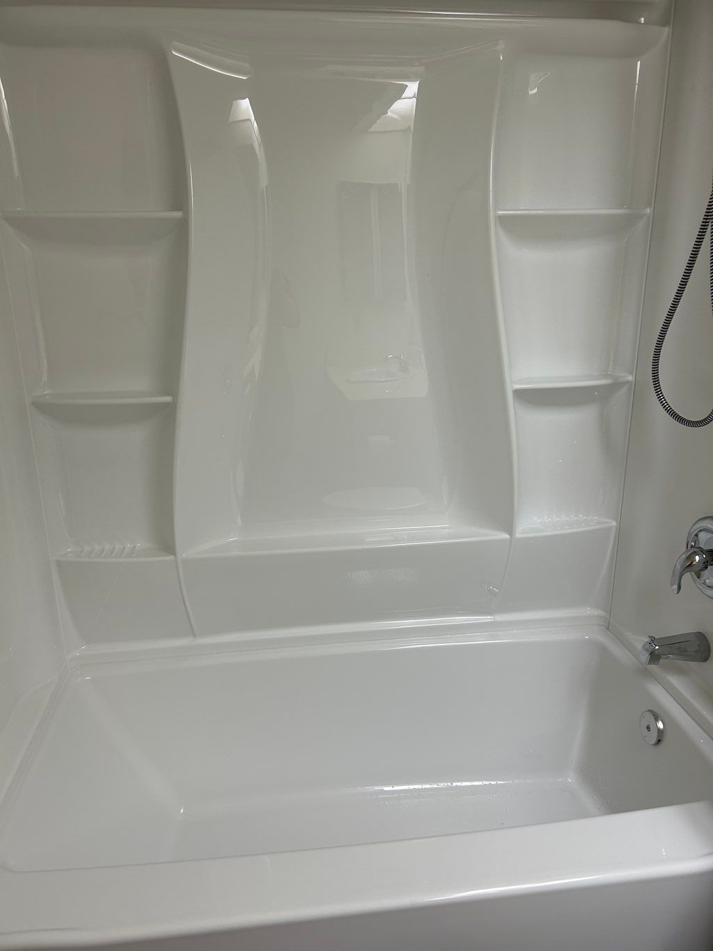 Had fiberglass tub and shower panels installed. Na