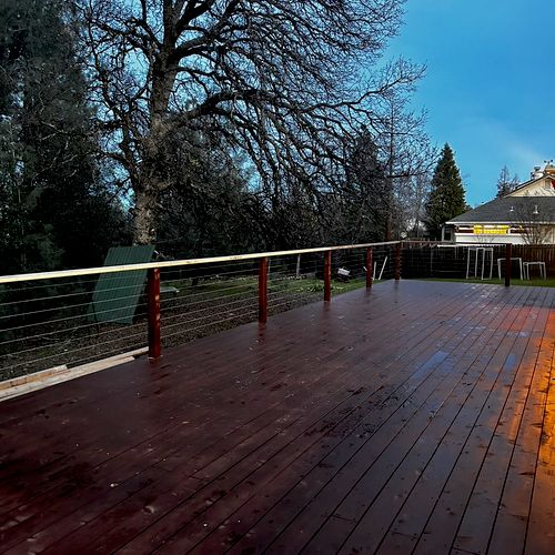 Cedar deck with “redwood” stain, cable handrail!