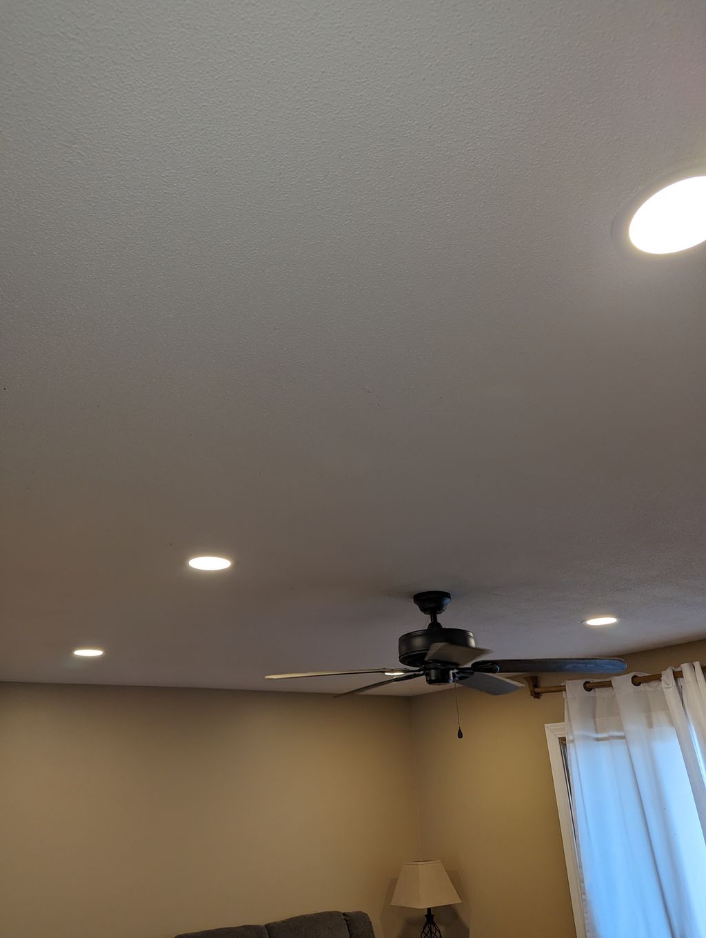 Added 6 led lights and a ceiling fan in the living