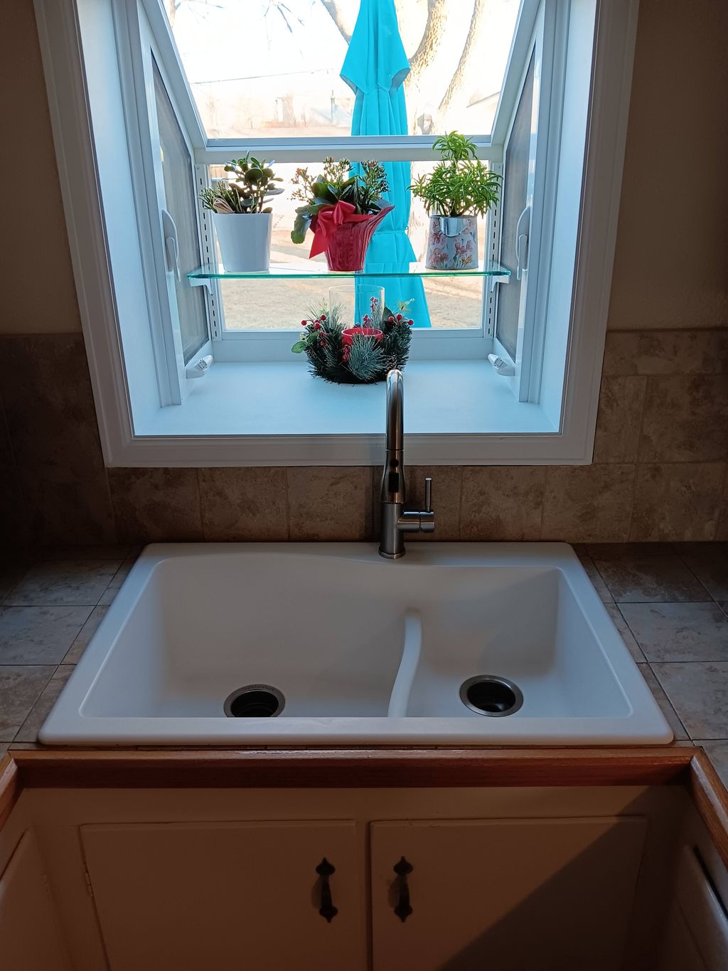 Installed kitchen sink, faucet, & water supply lin