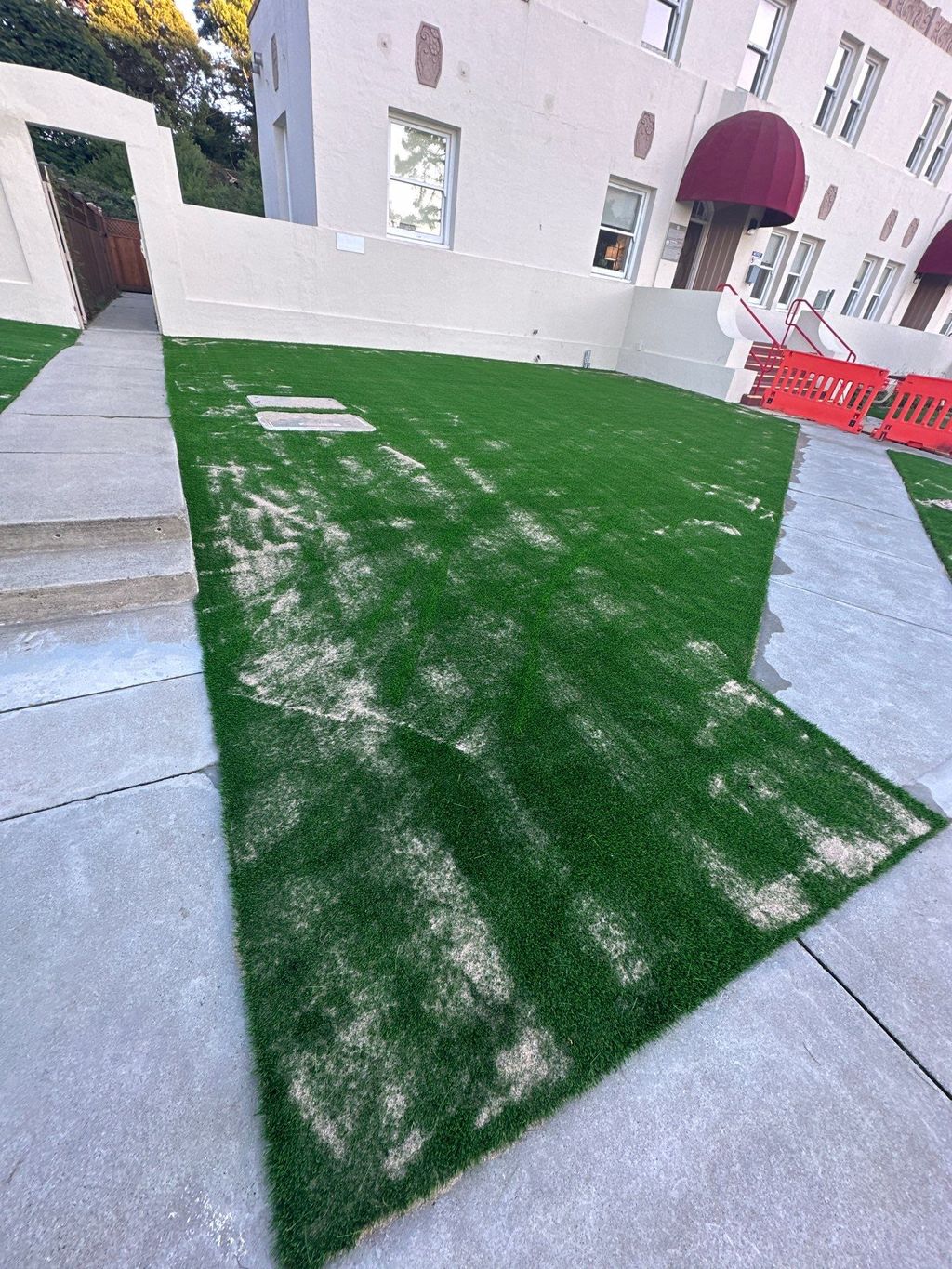 installation of artificial turf before brushing th
