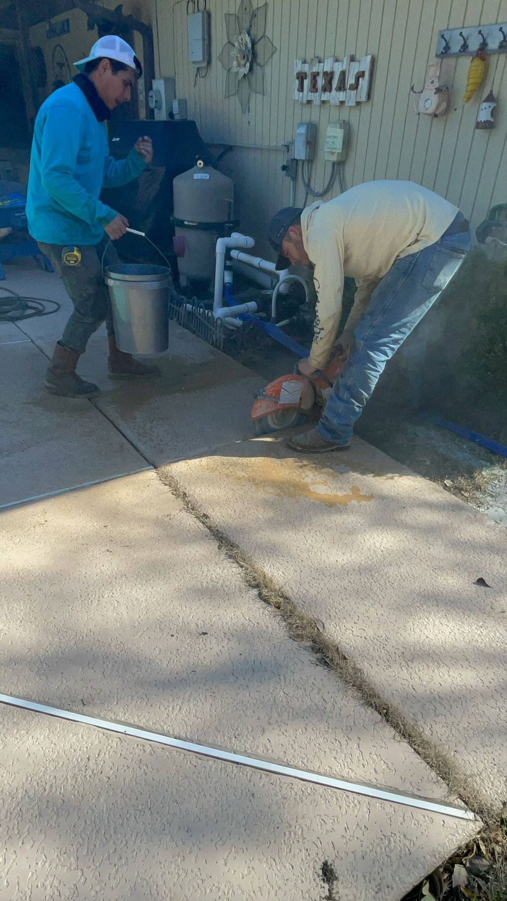 our guys working hard doing a skimmer replacement 