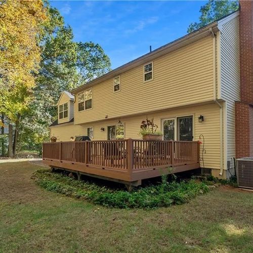 Repaired and refinished back porch