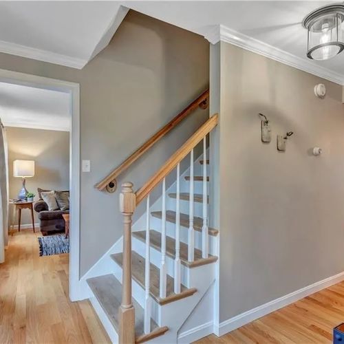 Replaced Red Oak stairway railing and stair treads