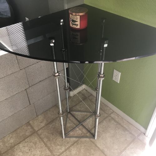 Corner table. Stainless and 1/2' smoked glass.