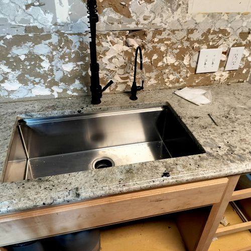 same countertop all new drawers and new faucet 